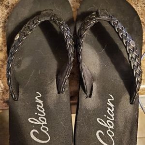 Cobian black flip flops